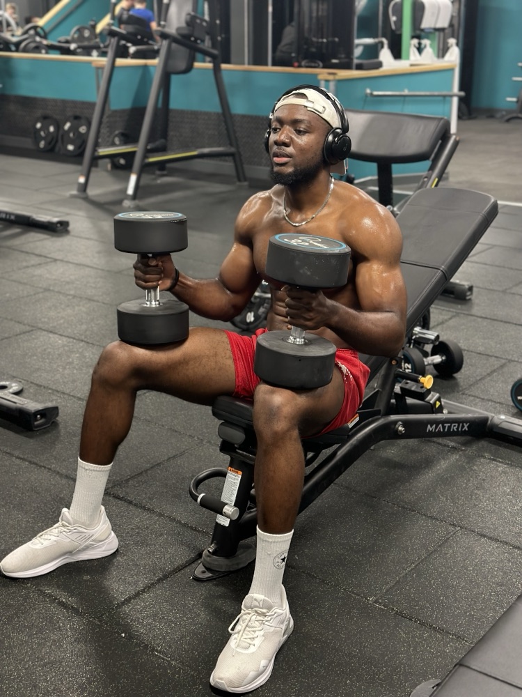Joe Hardy training with dumbbells